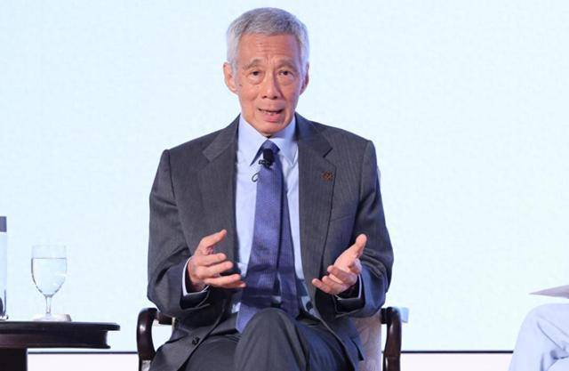 李显龙新身份首访华,中方给予高规格接待,新加坡未来走向引关注